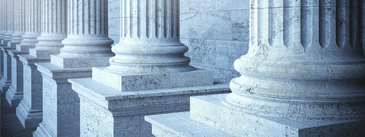 close-up photo of stone columns on a government building