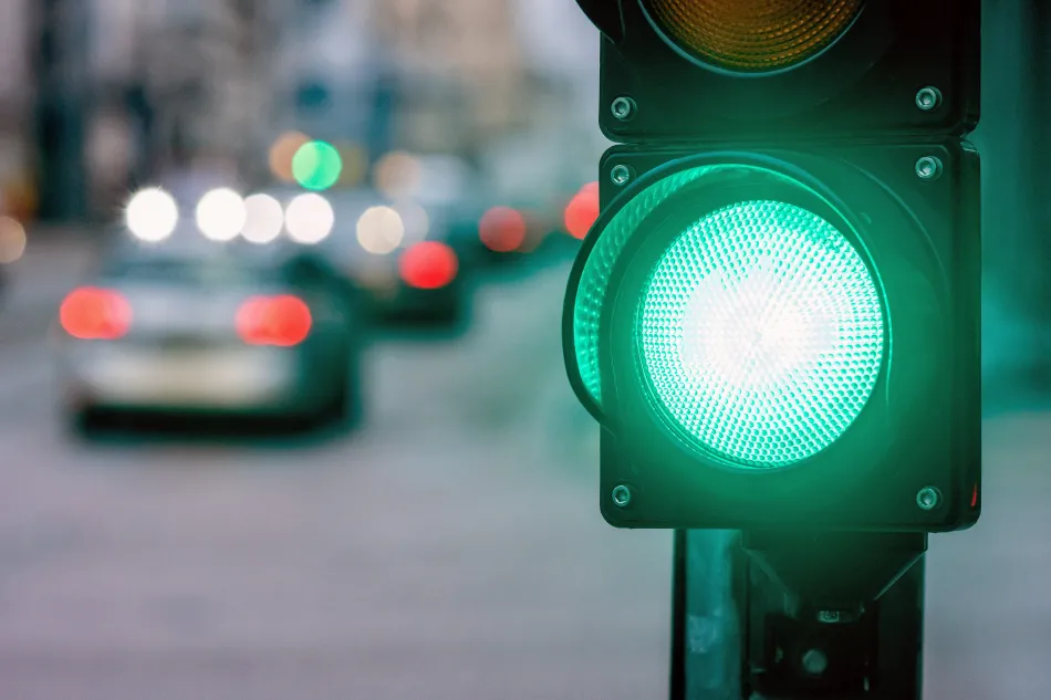 close-up image of a lit green traffic light
